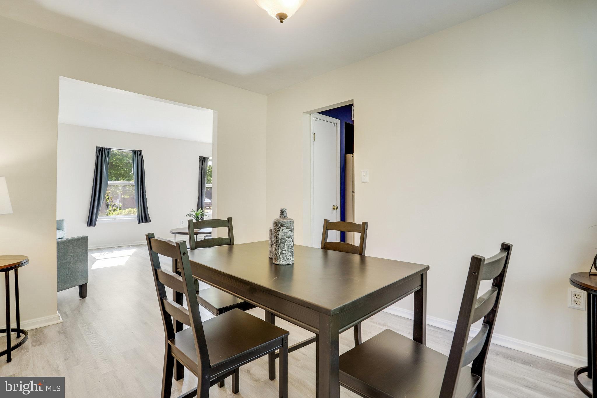 6903 Cherryfield Road Fort Washington, MD 20744 - Photo 11 of 58 a view of a dining room with furniture