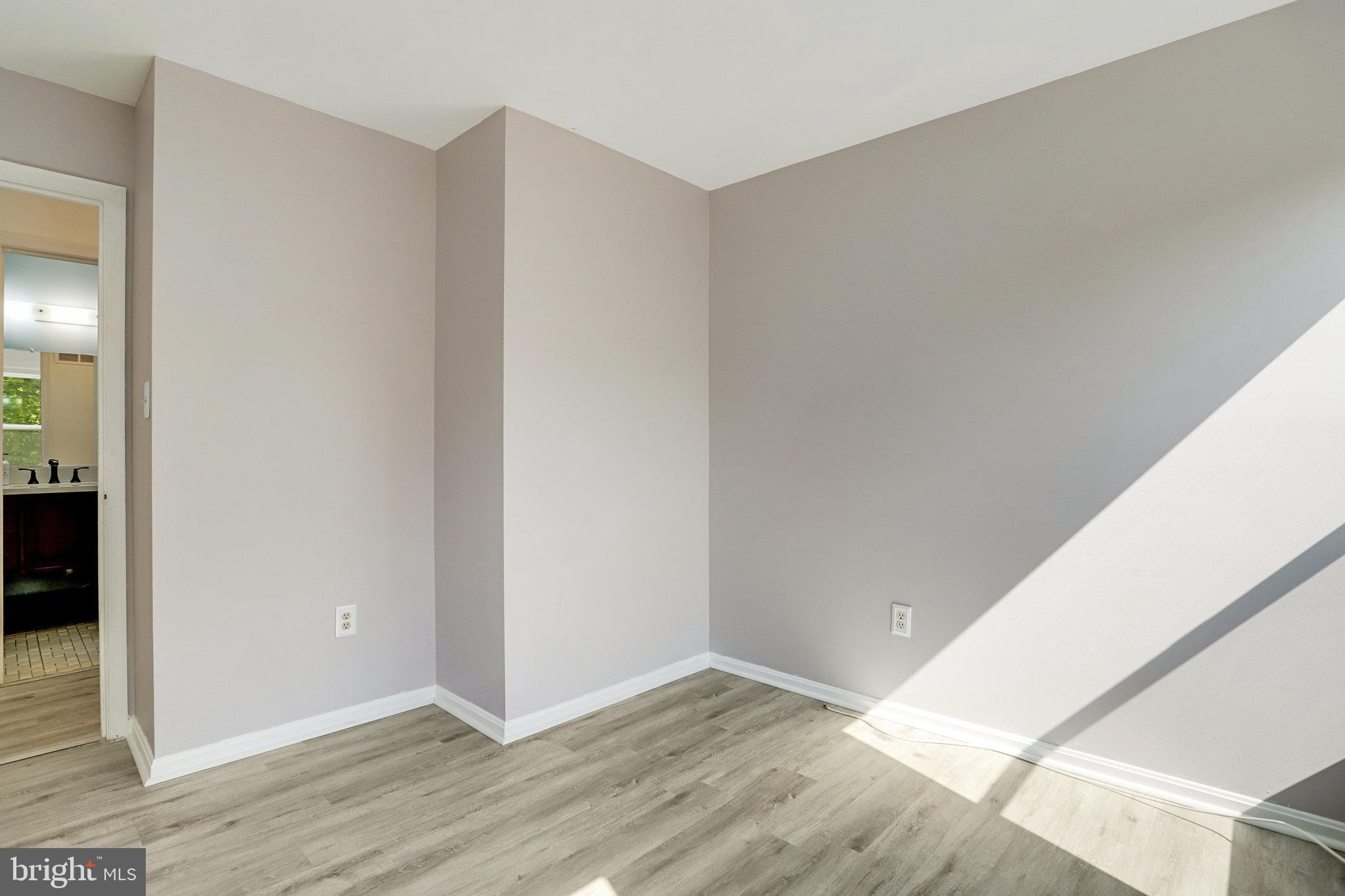 6903 Cherryfield Road Fort Washington, MD 20744 - Photo 29 of 58 a view of an empty room with wooden floor