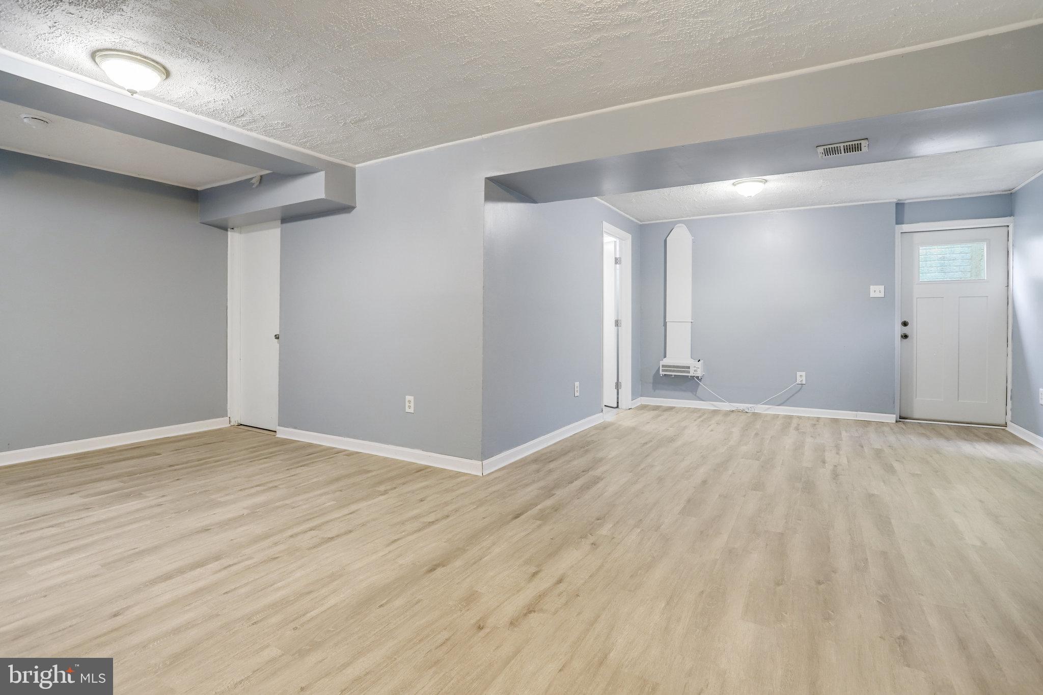 6903 Cherryfield Road Fort Washington, MD 20744 - Photo 48 of 58 a view of an empty room and wooden floor
