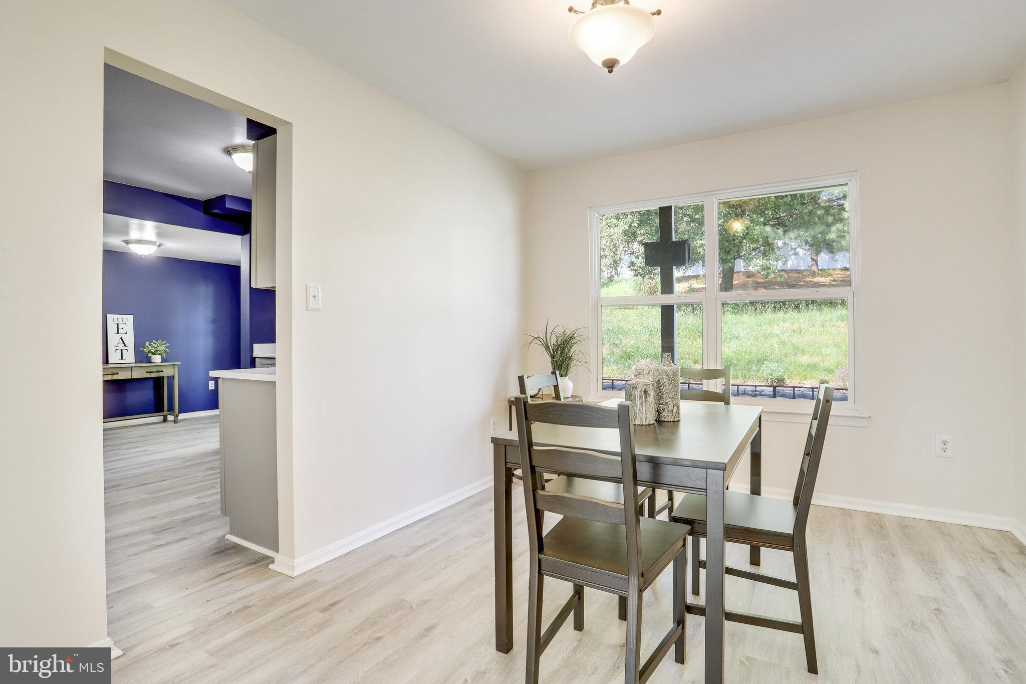 6903 Cherryfield Road Fort Washington, MD 20744 - Photo 10 of 58 a dining room with furniture and window
