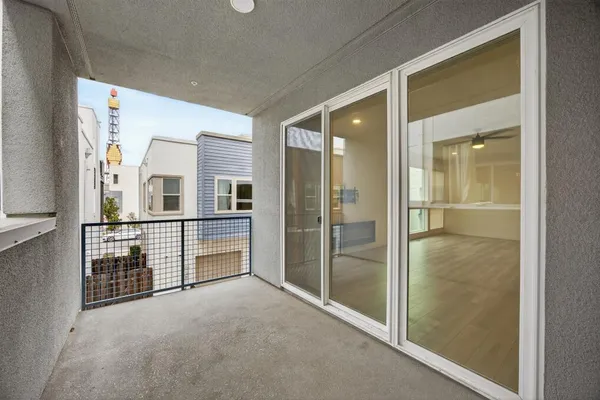 a bathroom with a shower and a sink