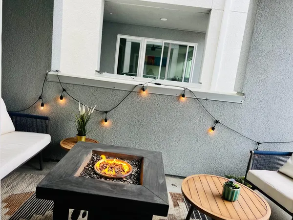 a living room with furniture and a window