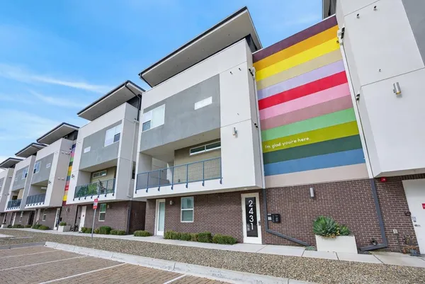a view of a building with a street