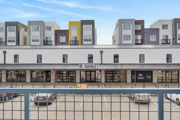 a front view of a building and a terrace