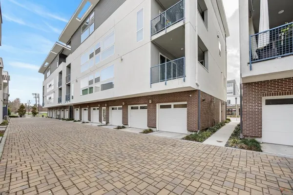 a front view of a building with many windows