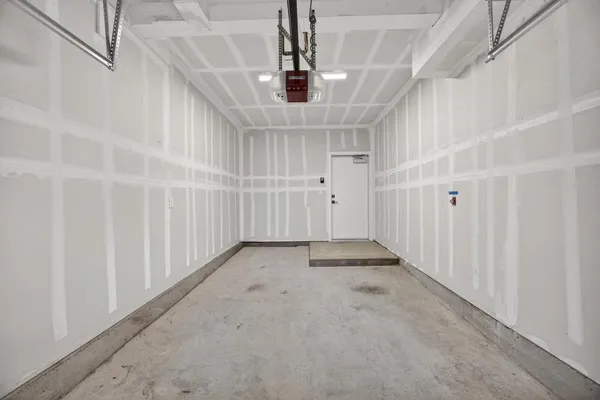 a view of a hallway with a chandelier