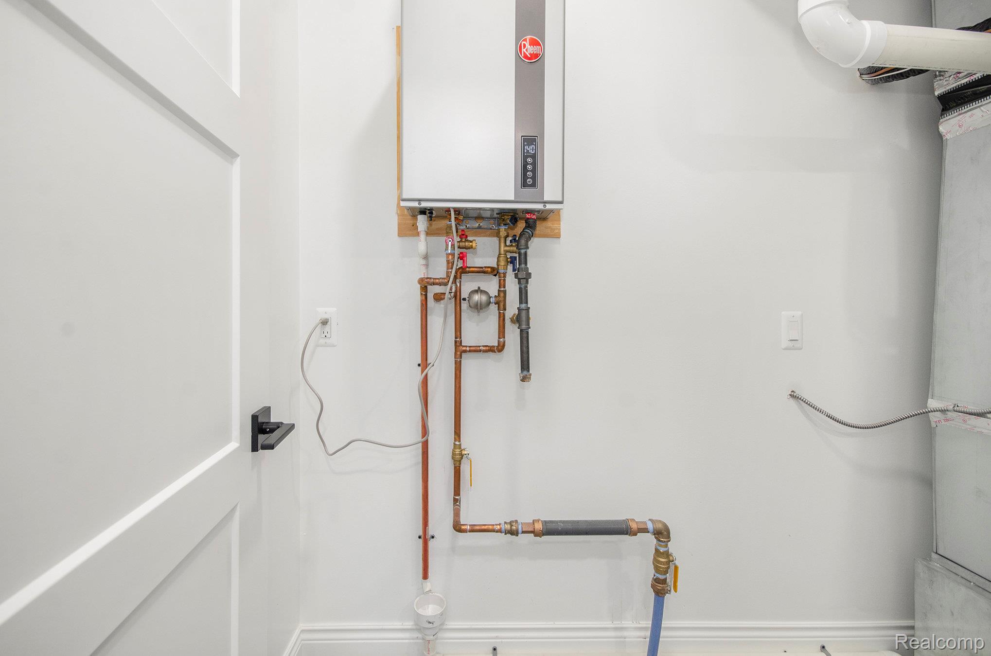 1223 North Main Street Rochester, MI 48307 - Photo 34 of 49 Tankless Hot Water Heater