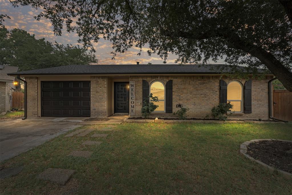 3154 Abbey Road Carrollton, TX 75007 - Photo 1 of 1 Single story home featuring concrete driveway, a garage, and brick siding