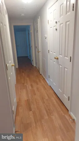 a utility room with toilet and a sink