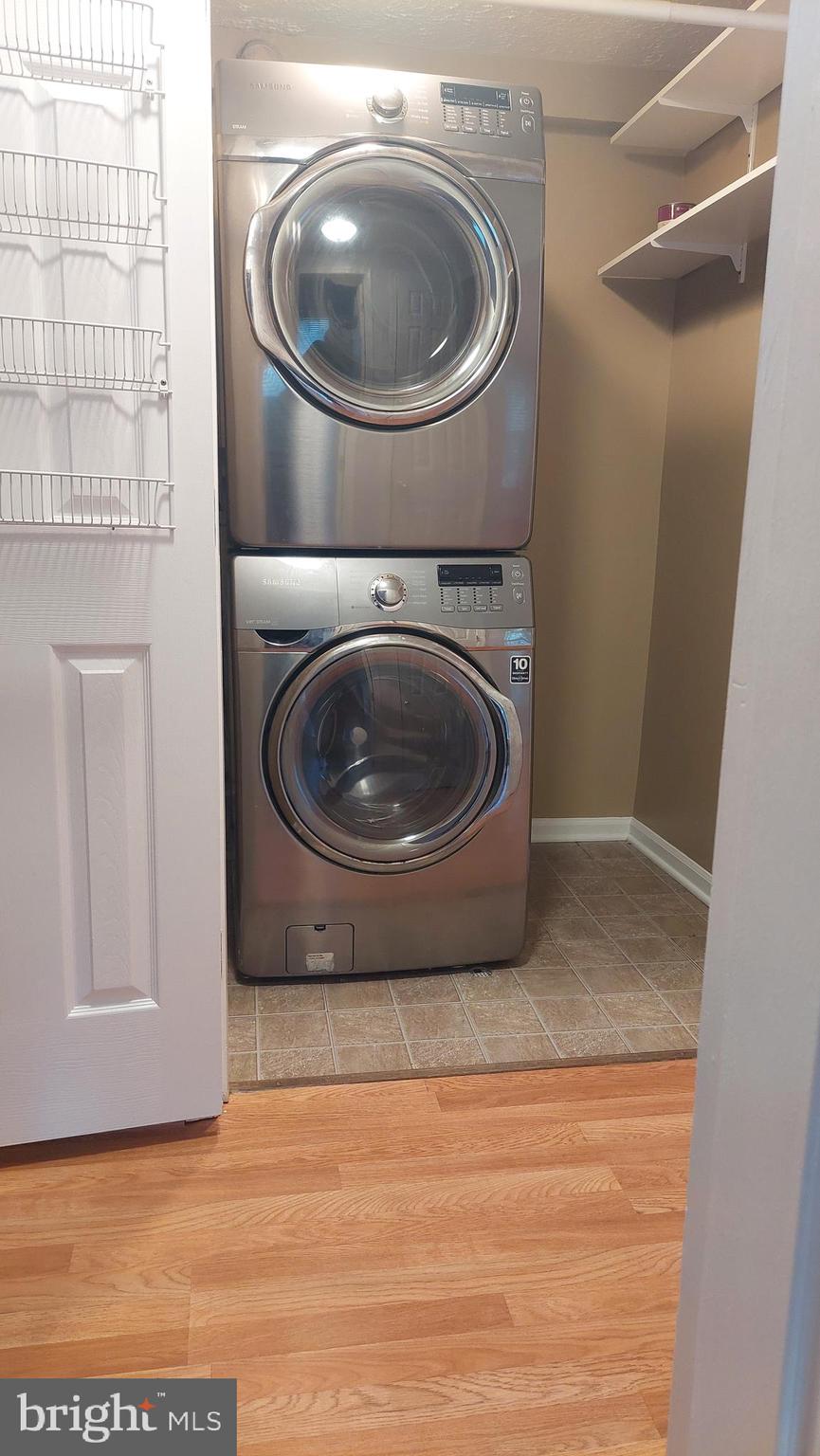 13107 Briarcliff Terrace, Unit 2203 Germantown, MD 20874 - Photo 32 of 53 a utility room with toilet and a sink