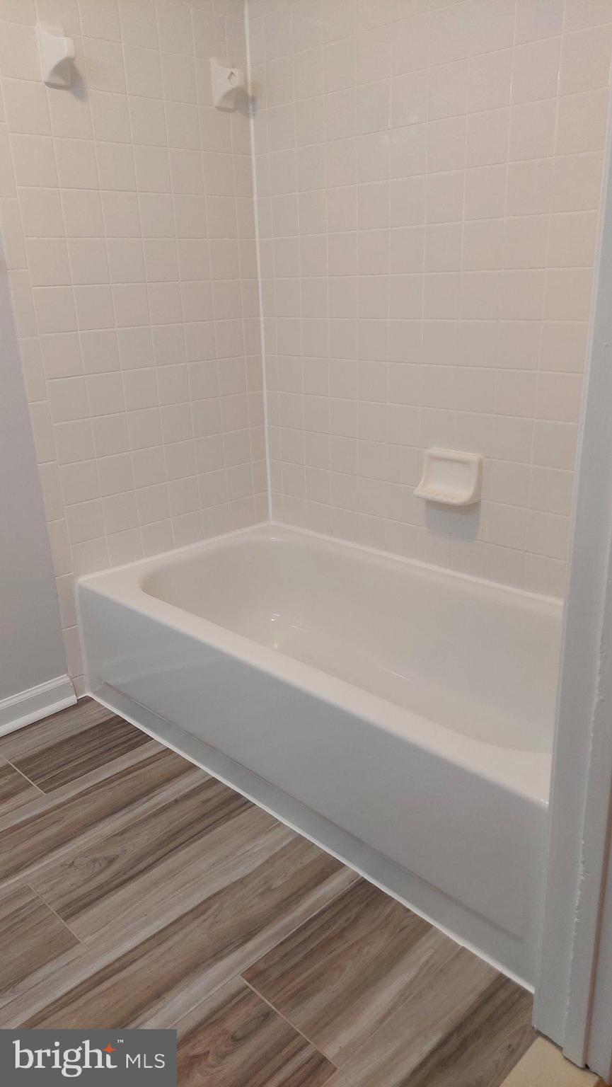 13107 Briarcliff Terrace, Unit 2203 Germantown, MD 20874 - Photo 43 of 53 a bathroom with a bathtub
