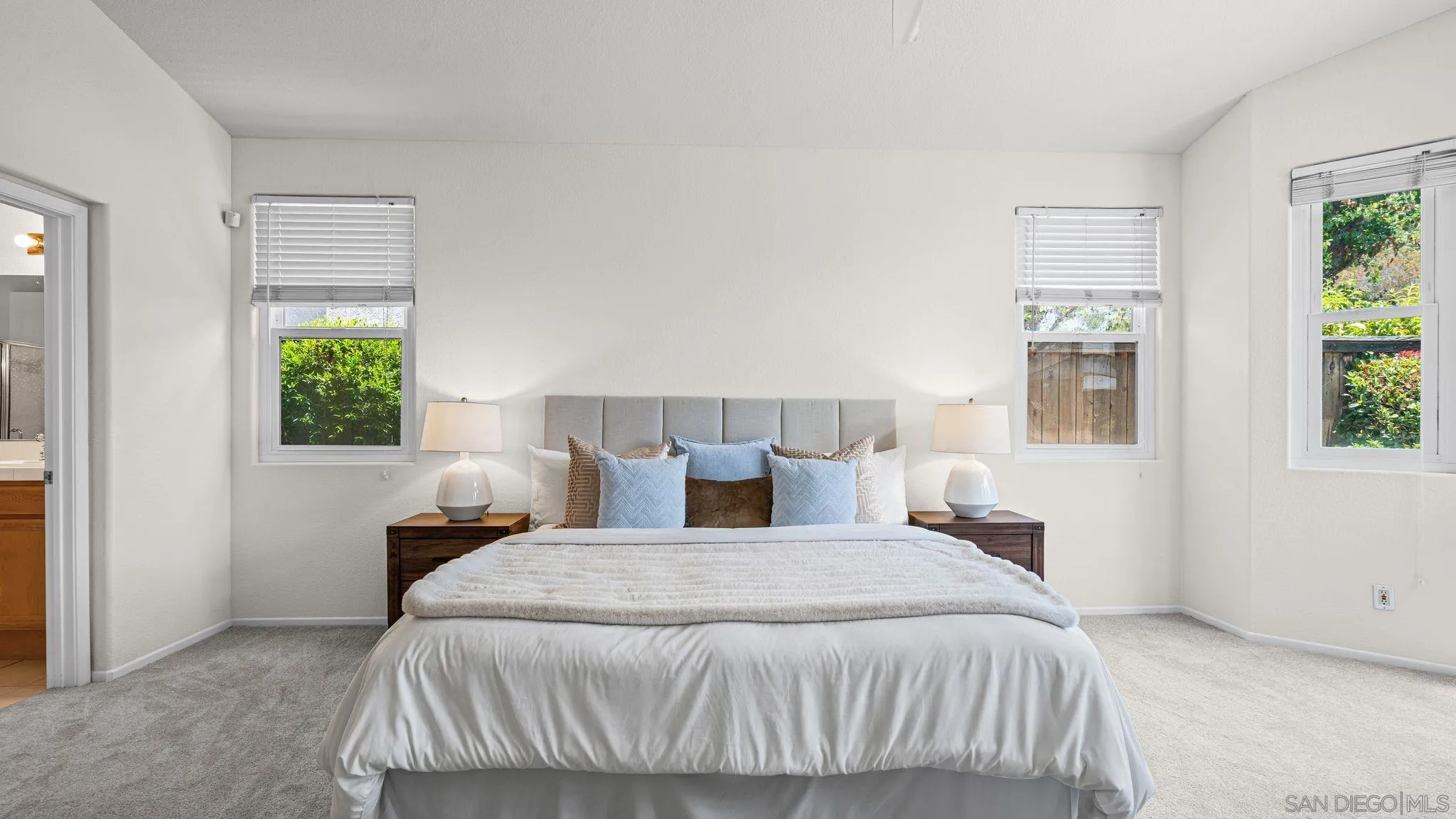 1783 Medinah Road San Marcos, CA 92069 - Photo 16 of 39 a bedroom with a bed and window