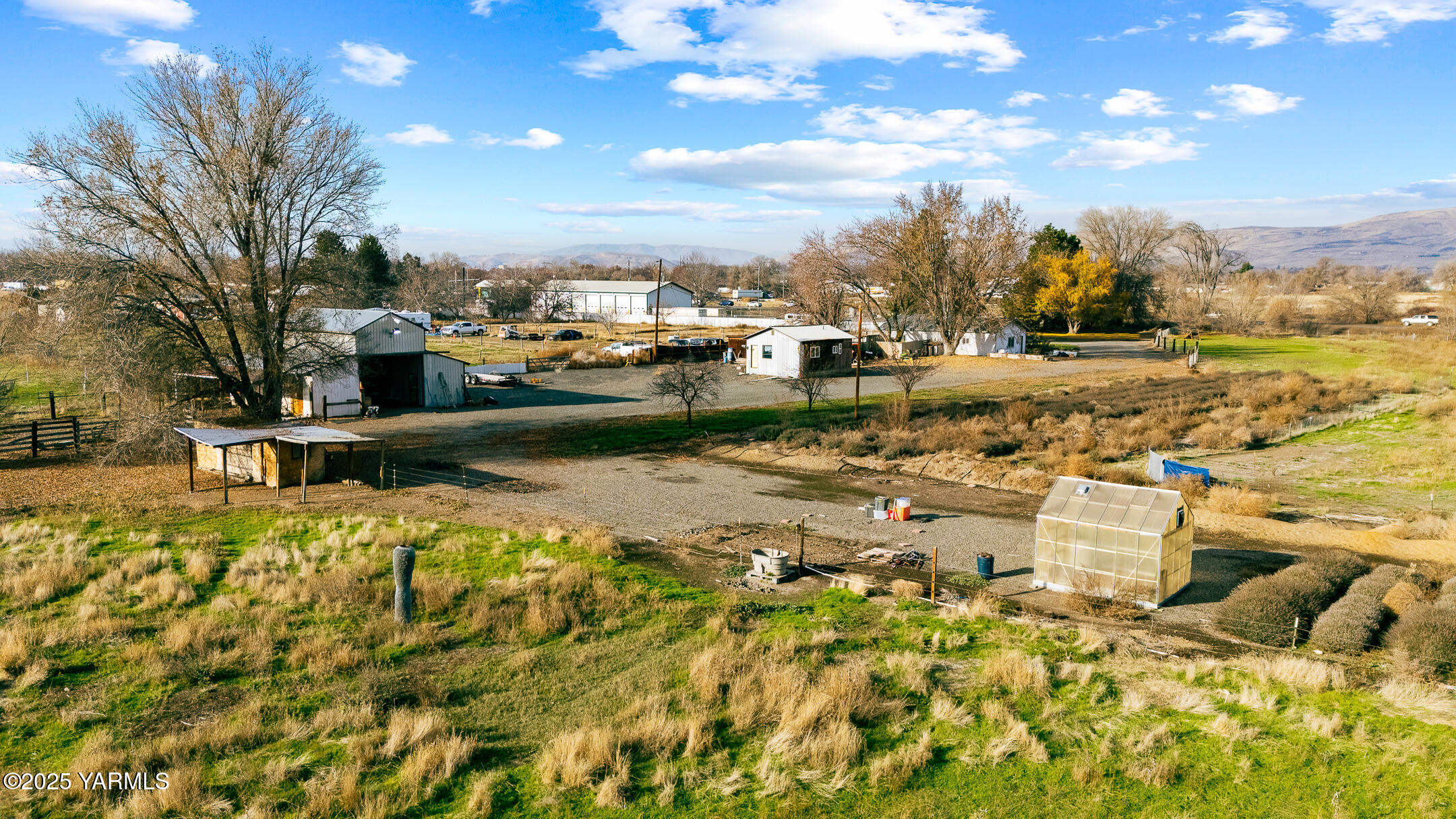 1803 Riverside Road Yakima, WA 98901 - Photo 13 of 53 a view of a yard with swimming pool