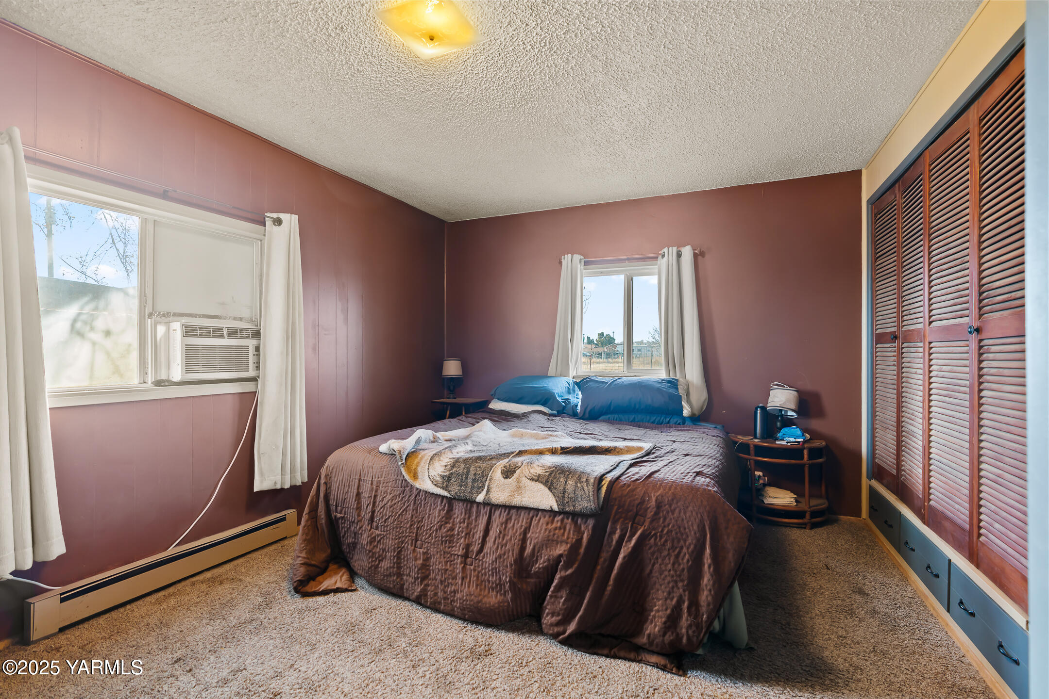 1803 Riverside Road Yakima, WA 98901 - Photo 14 of 53 a bedroom with a bed and window