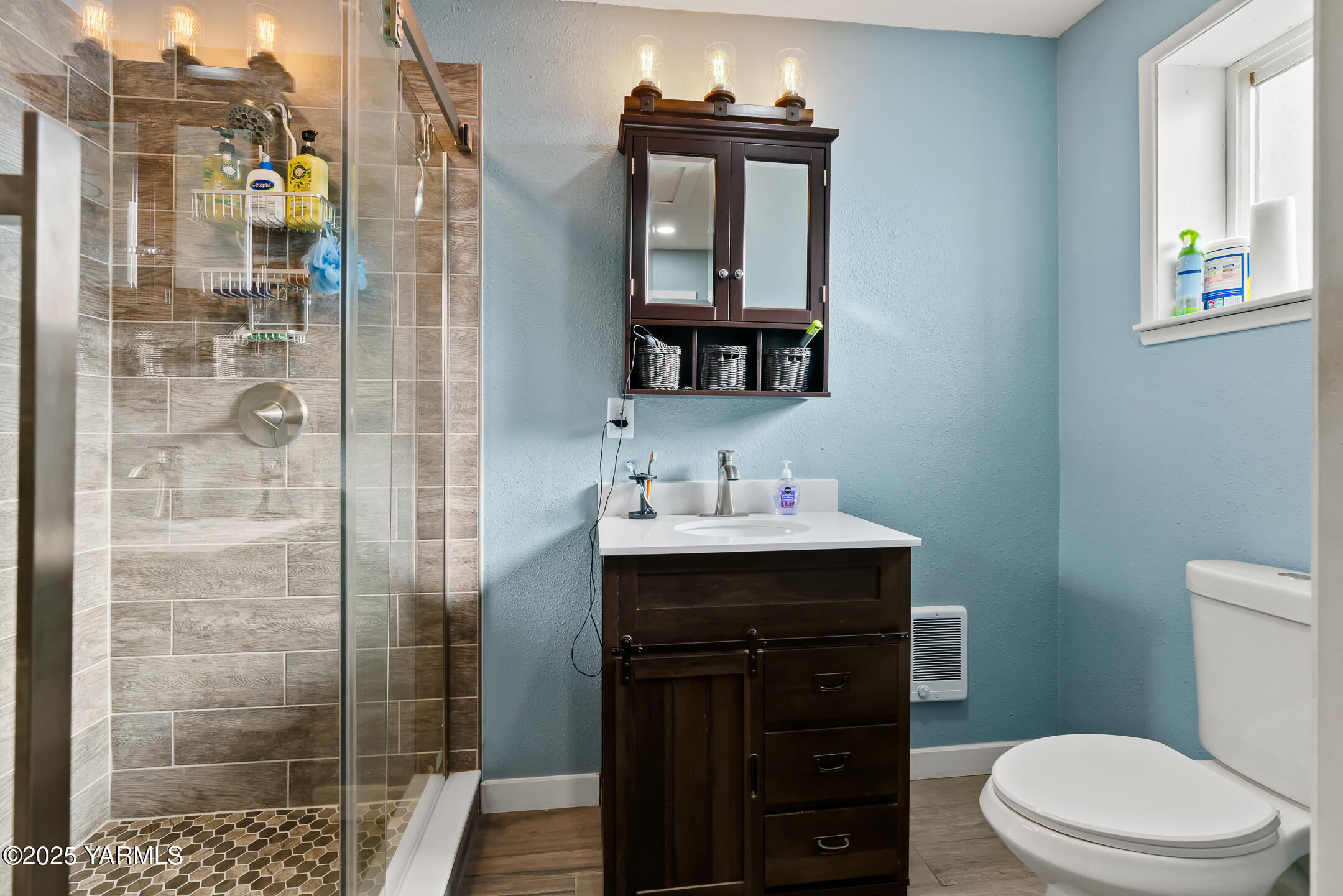1803 Riverside Road Yakima, WA 98901 - Photo 20 of 53 a bathroom with a sink a toilet and shower