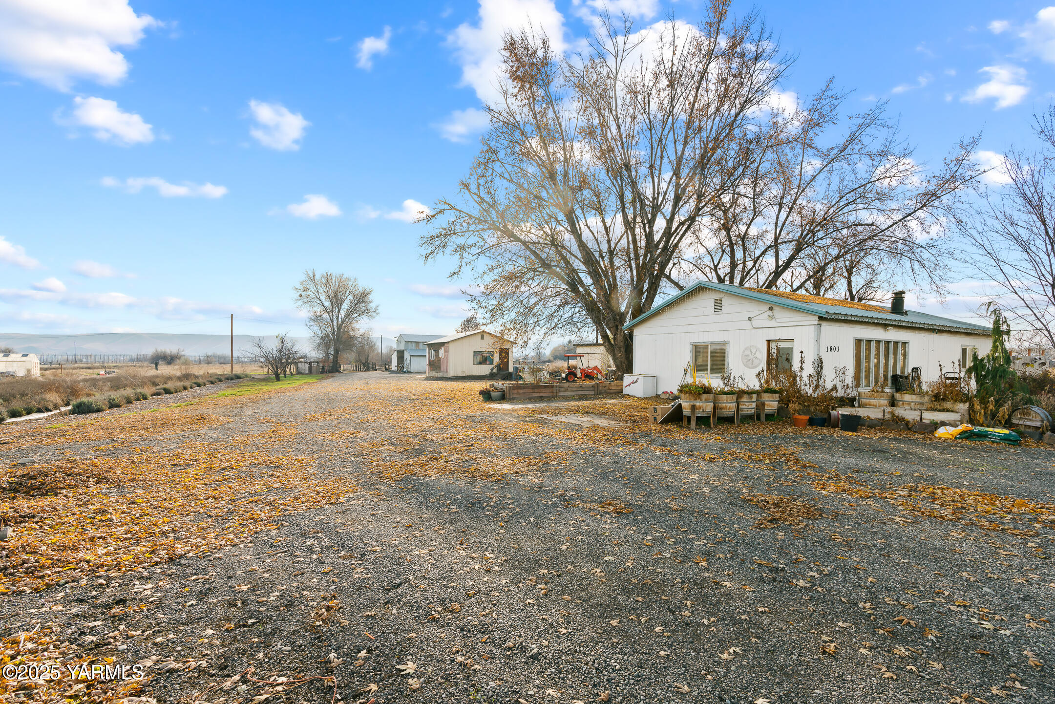 1803 Riverside Road Yakima, WA 98901 - Photo 50 of 53 a view of a house with a yard