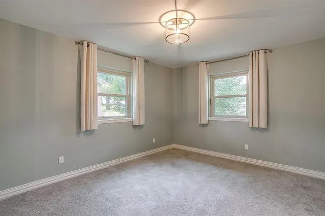 an empty room with a window
