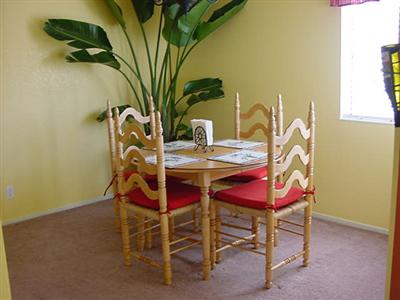 40 Meridian Circle Rohnert Park, CA 94928 - Photo 3 of 9 a dining room with furniture and a potted plant