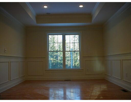 Lot 7 Hay Road Ashburnham, MA 01430 - Photo 2 of 9 an empty room with wooden floor and windows