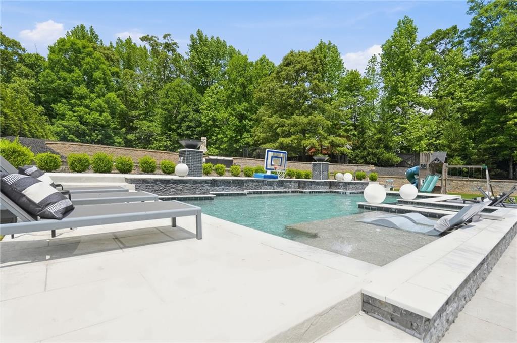 3020 Wallace Road Buford, GA 30519 - Photo 51 of 66 a view of a patio with swimming pool
