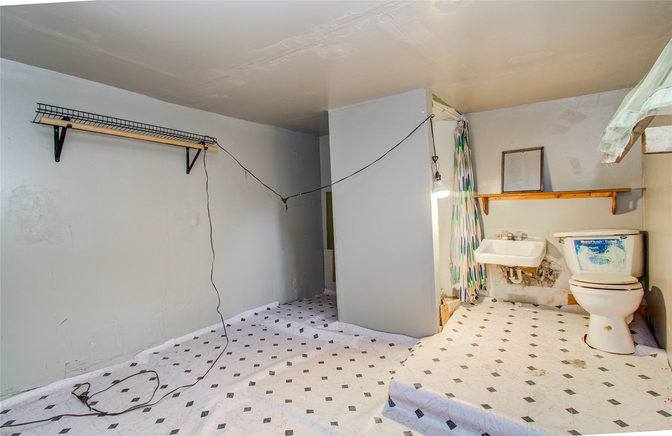 10038 Bamboo Road Houston, TX 77041 - Photo 21 of 36 a bedroom with a bed and cabinets