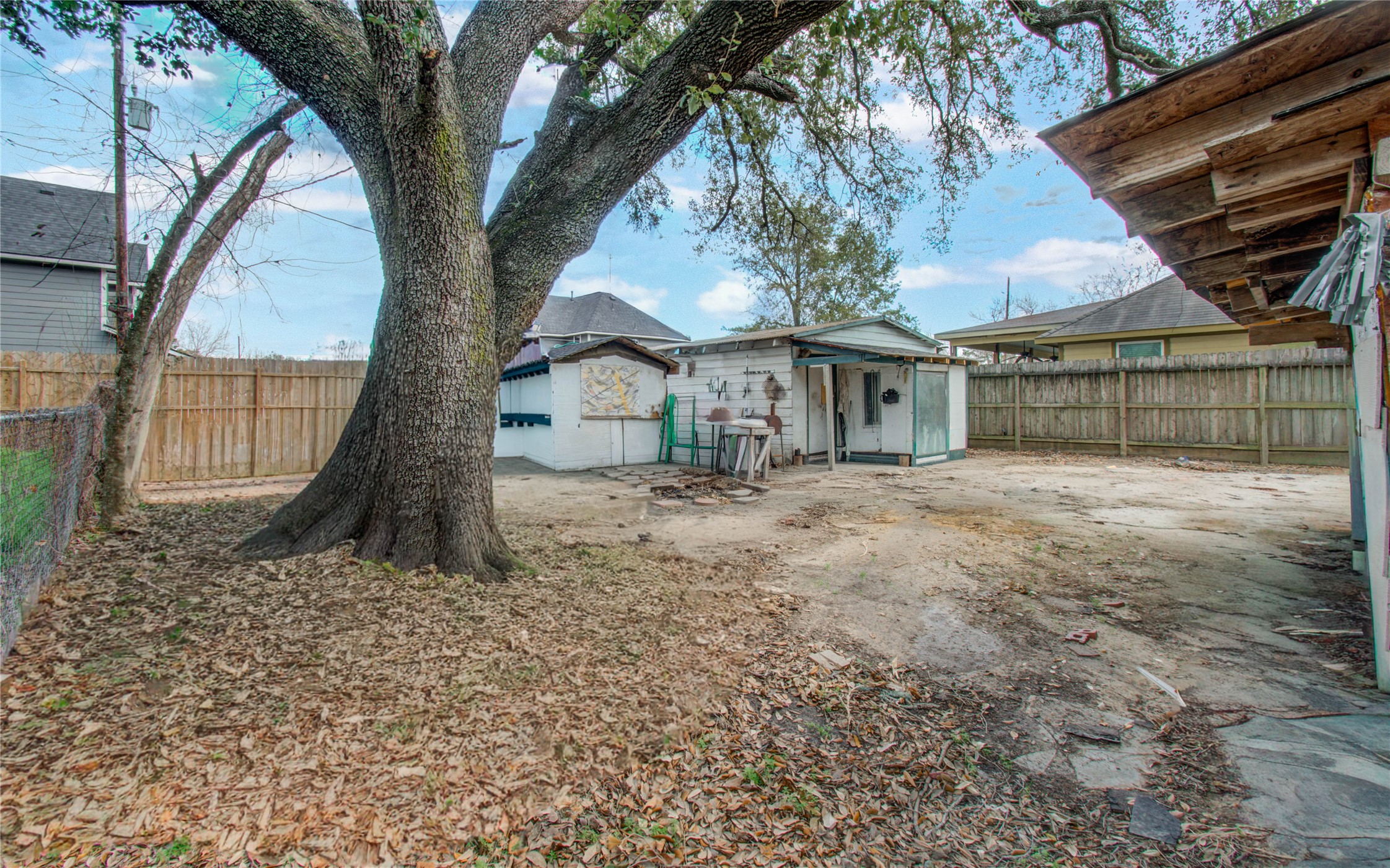 10038 Bamboo Road Houston, TX 77041 - Photo 34 of 36 a view of a house with a tree in the yard