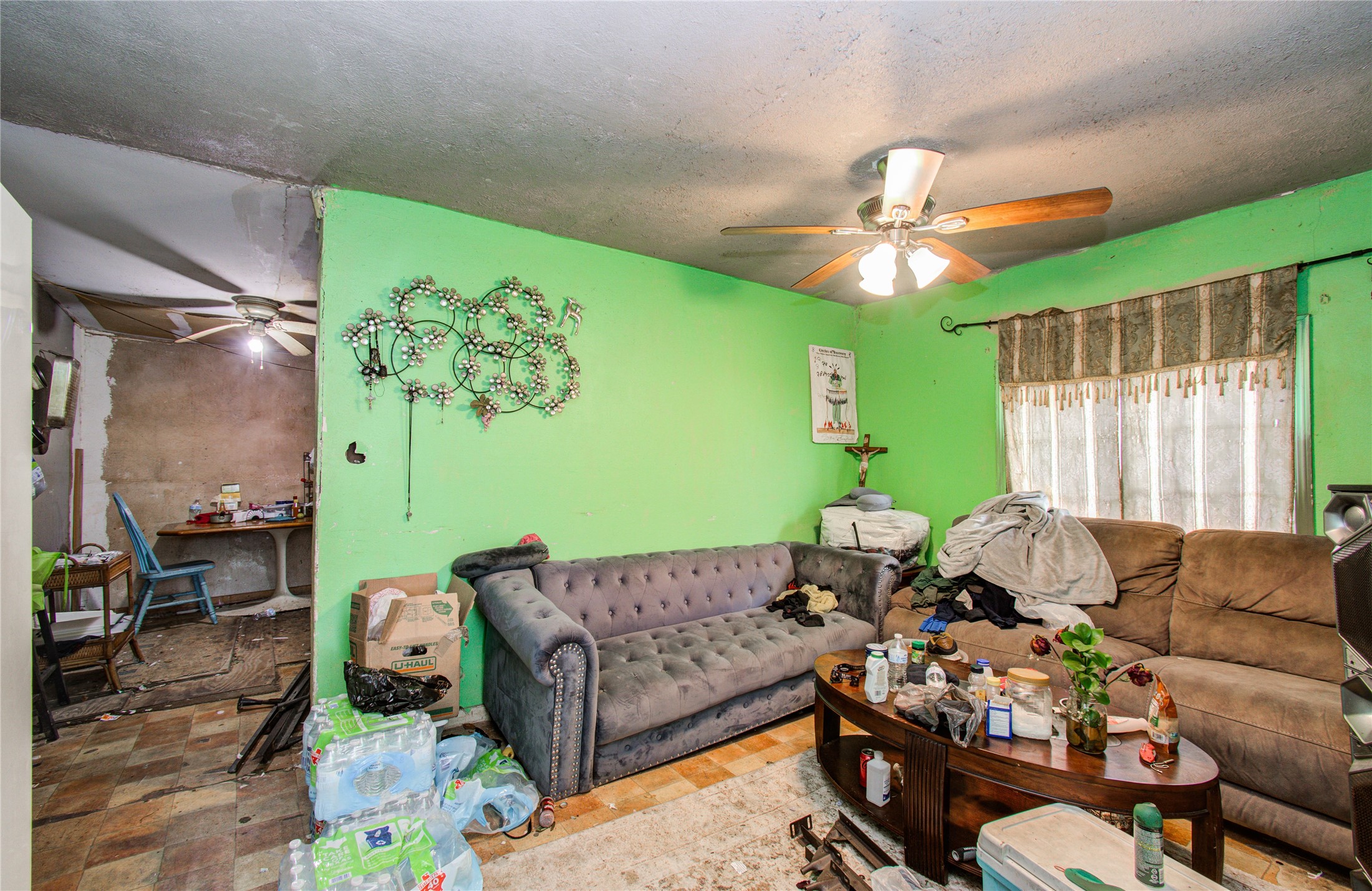 10038 Bamboo Road Houston, TX 77041 - Photo 9 of 36 a living room with furniture and a window