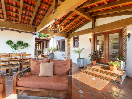 a view of a chairs and tables in the patio
