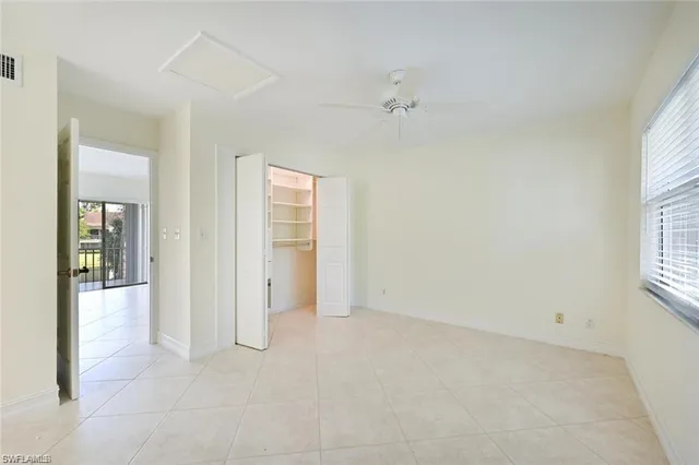 an empty room with windows