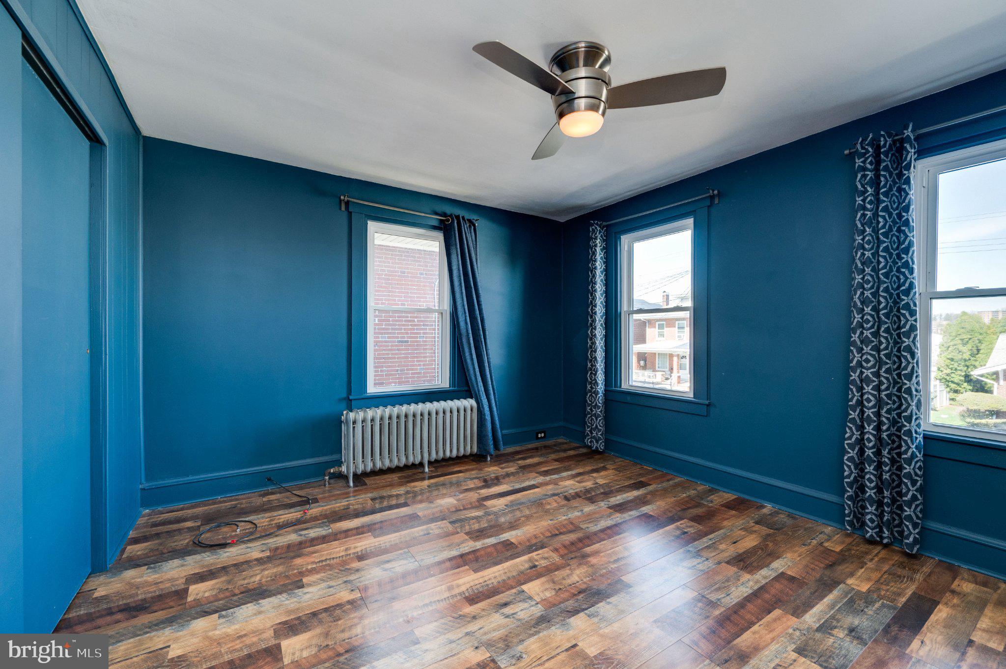 1336 Fern Avenue Reading, PA 19607 - Photo 16 of 21 Vibrant blue room with natural light.