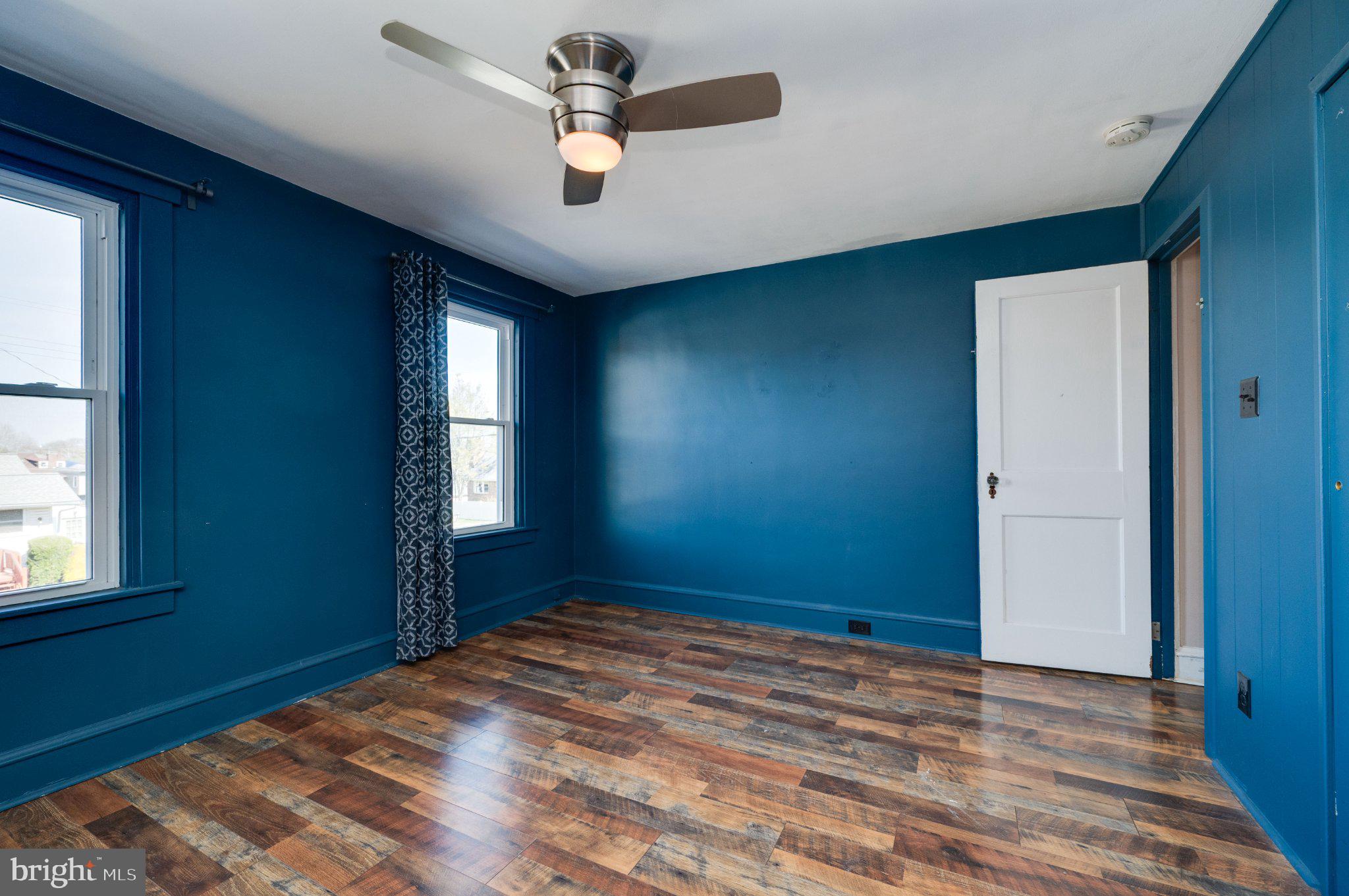 1336 Fern Avenue Reading, PA 19607 - Photo 17 of 21 Vibrant blue room with natural light.