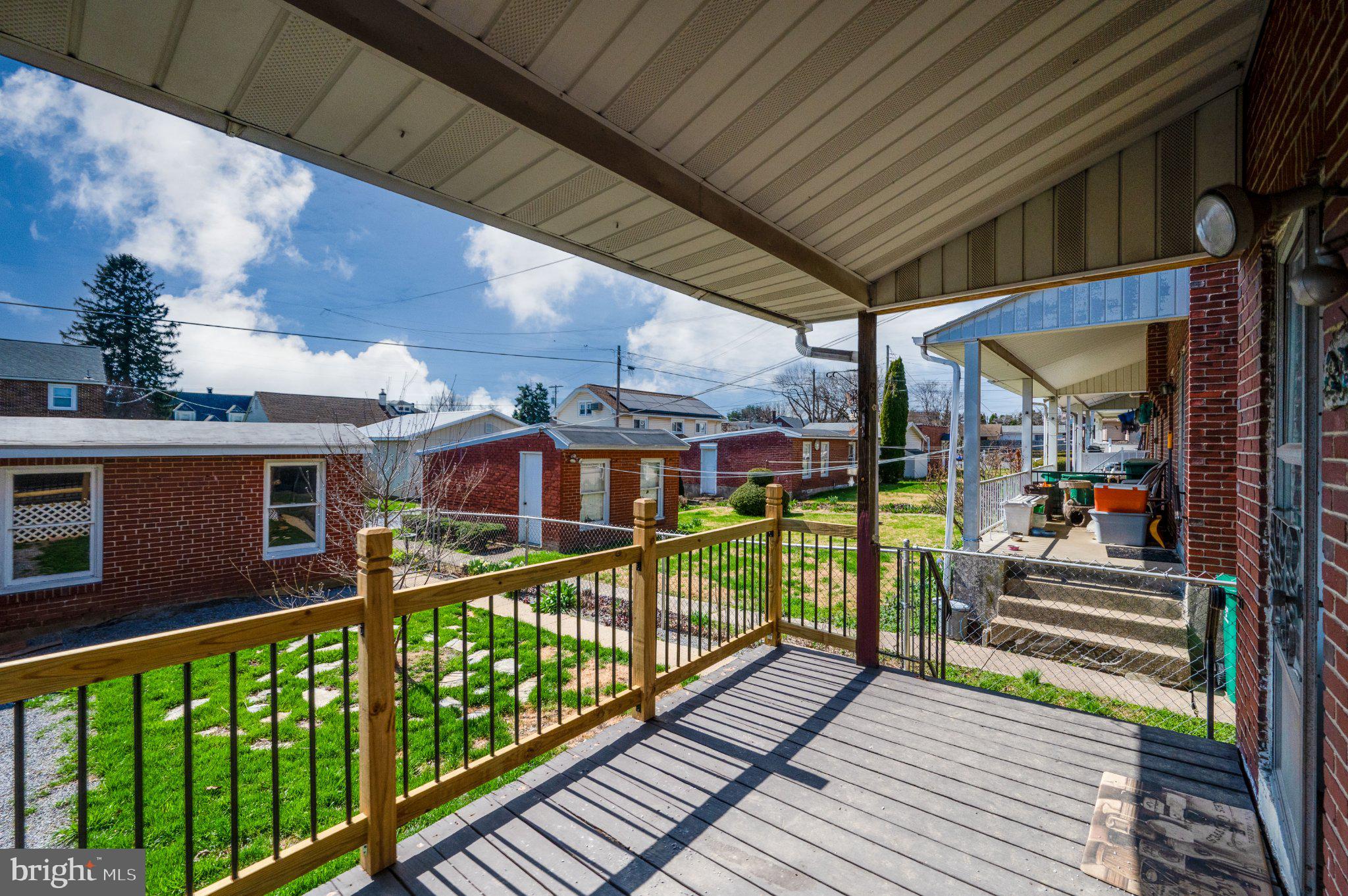 1336 Fern Avenue Reading, PA 19607 - Photo 18 of 21 Sunny porch with a view of greenery.