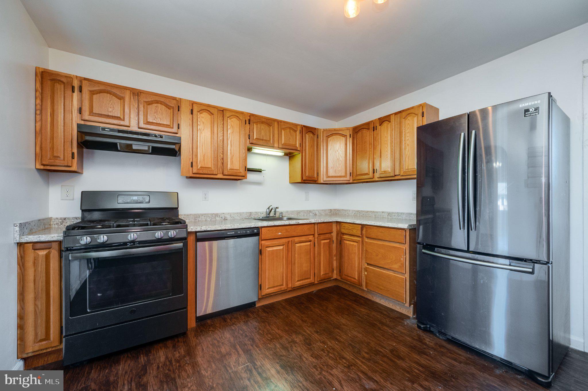 1336 Fern Avenue Reading, PA 19607 - Photo 9 of 21 Modern kitchen with warm wood accents.