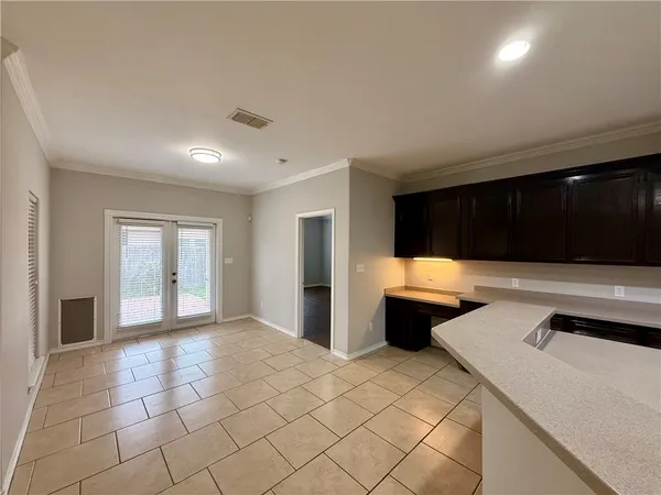 a view of an empty room and window