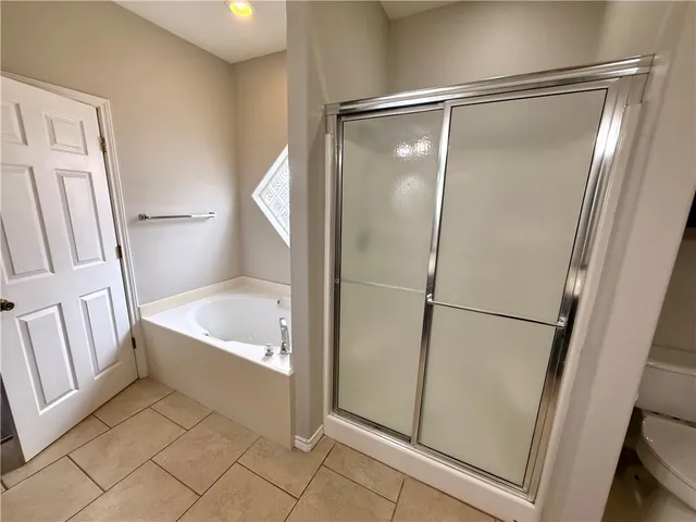 a bathroom with a toilet and a sink