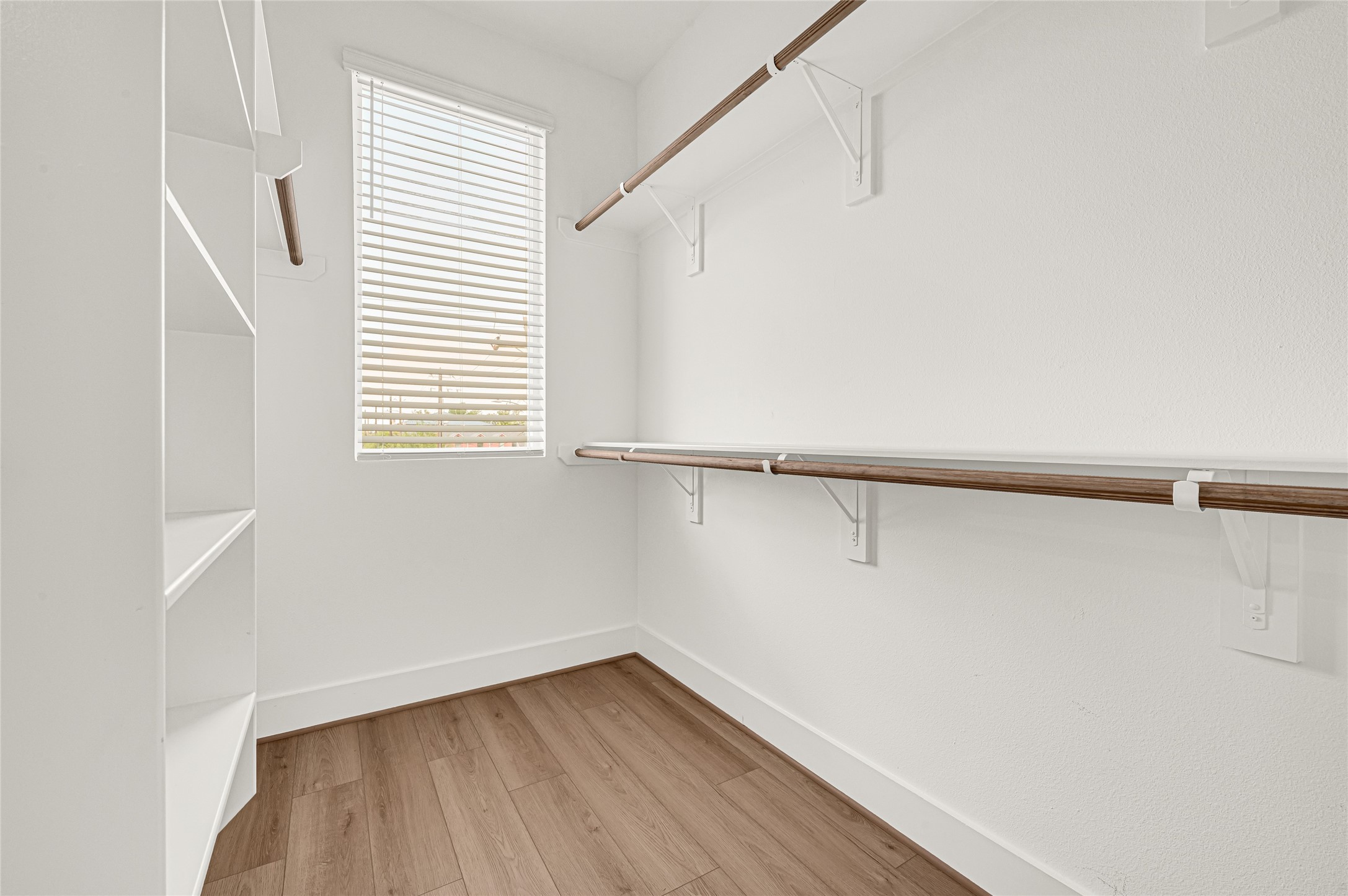 4201 Stassen Street Houston, TX 77051 - Photo 21 of 39 a view of a room with wooden floor and a window