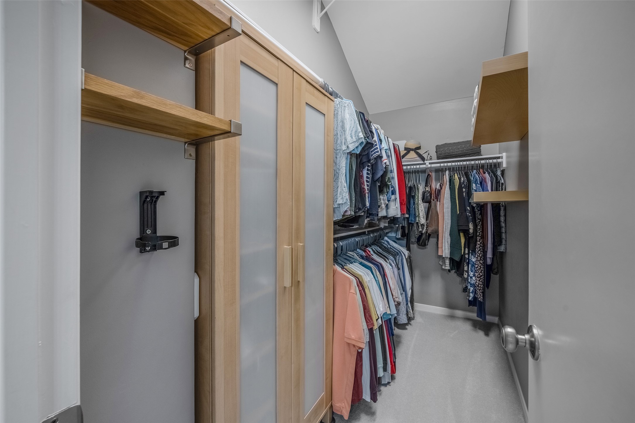 1028 La Rue Street Houston, TX 77019 - Photo 17 of 29 Efficient primary closet system with shoe cabinet.