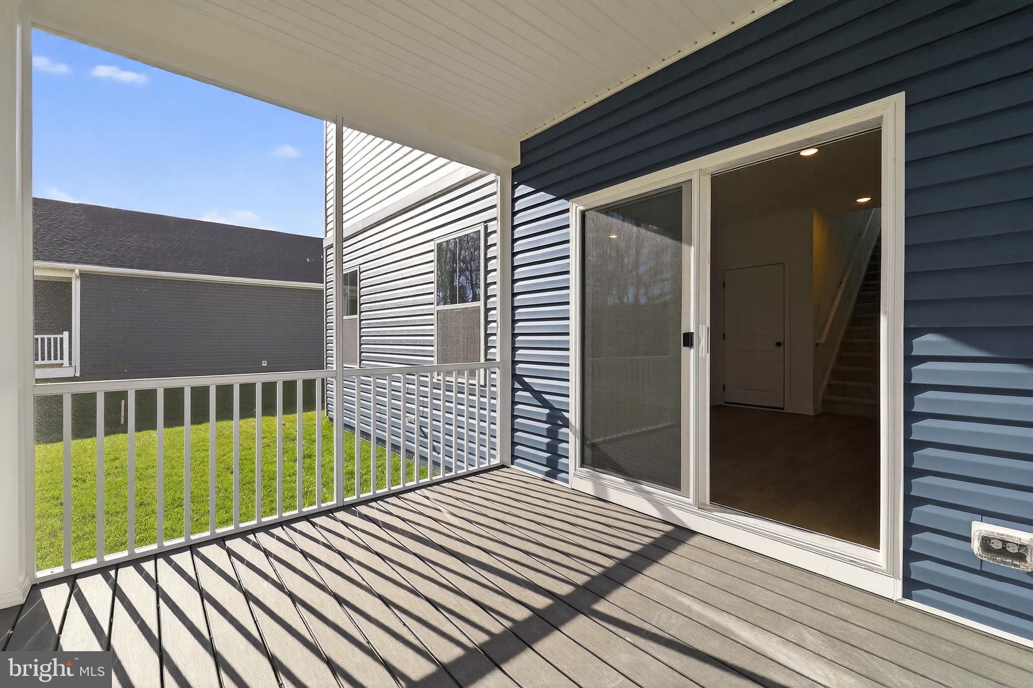 14956 Channel Run Ellendale, DE 19941 - Photo 13 of 28 a view of balcony and wooden floor