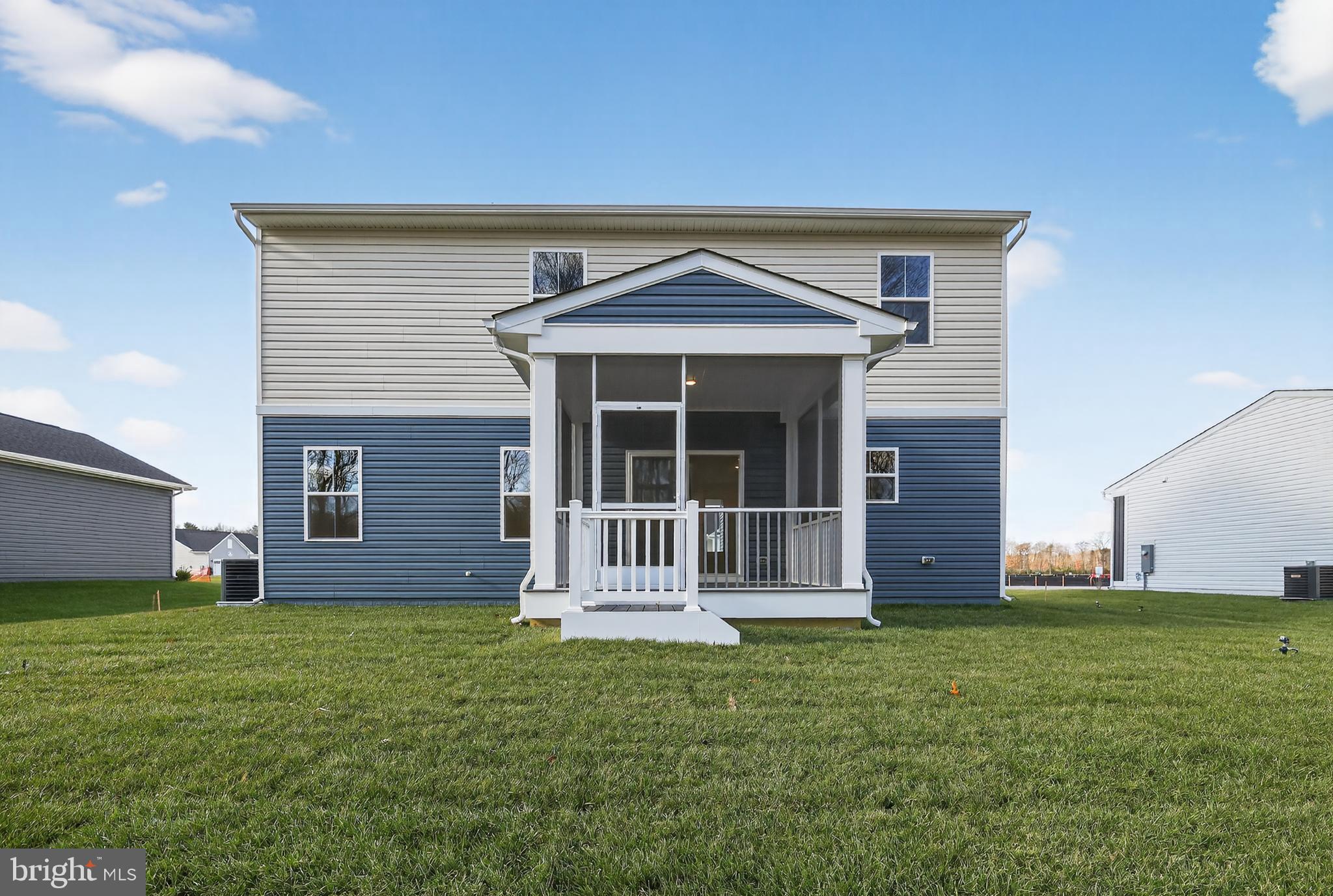 14956 Channel Run Ellendale, DE 19941 - Photo 14 of 28 a front view of house with yard