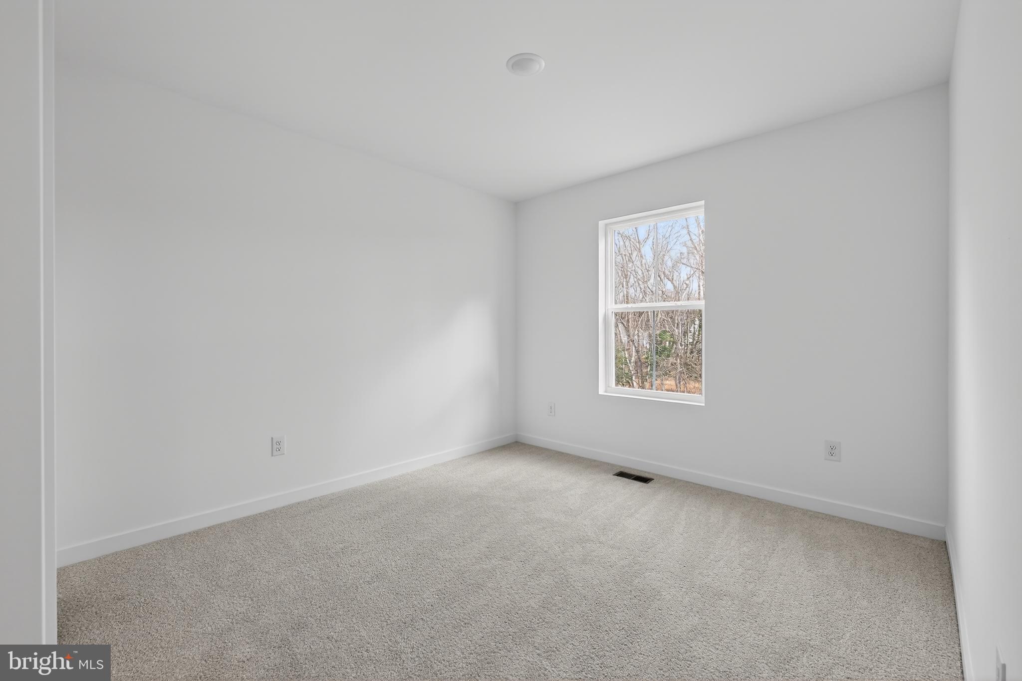 14956 Channel Run Ellendale, DE 19941 - Photo 27 of 28 a view of room with hardwood floor and window