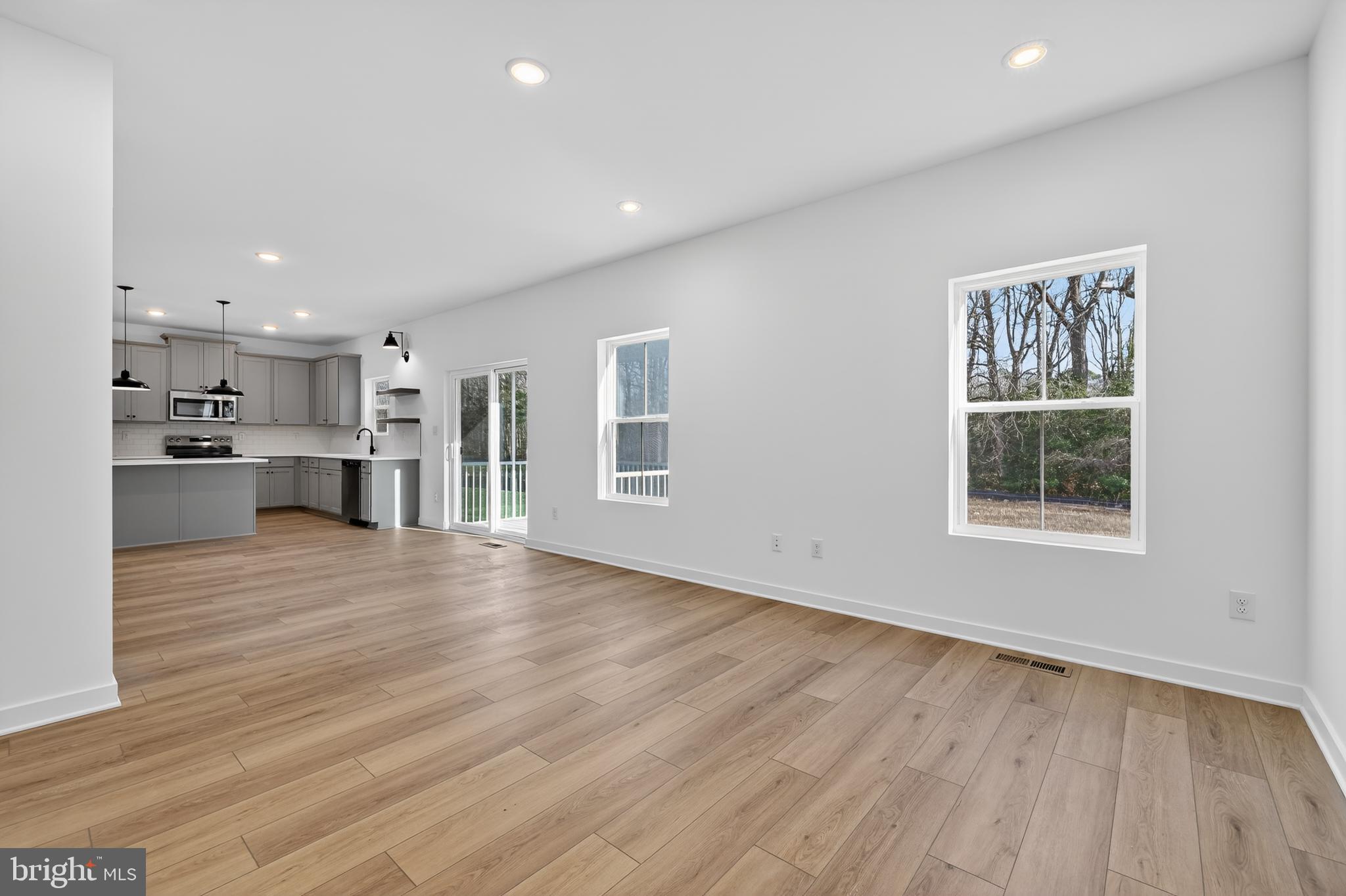 14956 Channel Run Ellendale, DE 19941 - Photo 8 of 28 a view of kitchen with refrigerator and window
