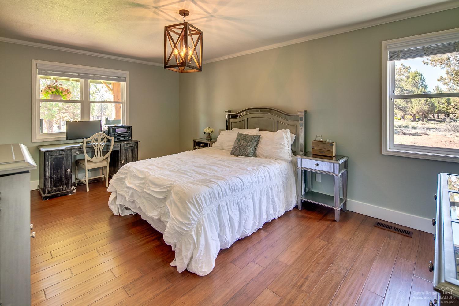 64517 Joe Neil Road Bend, OR 97701 - Photo 17 of 25 A guest suite on the main level offers s