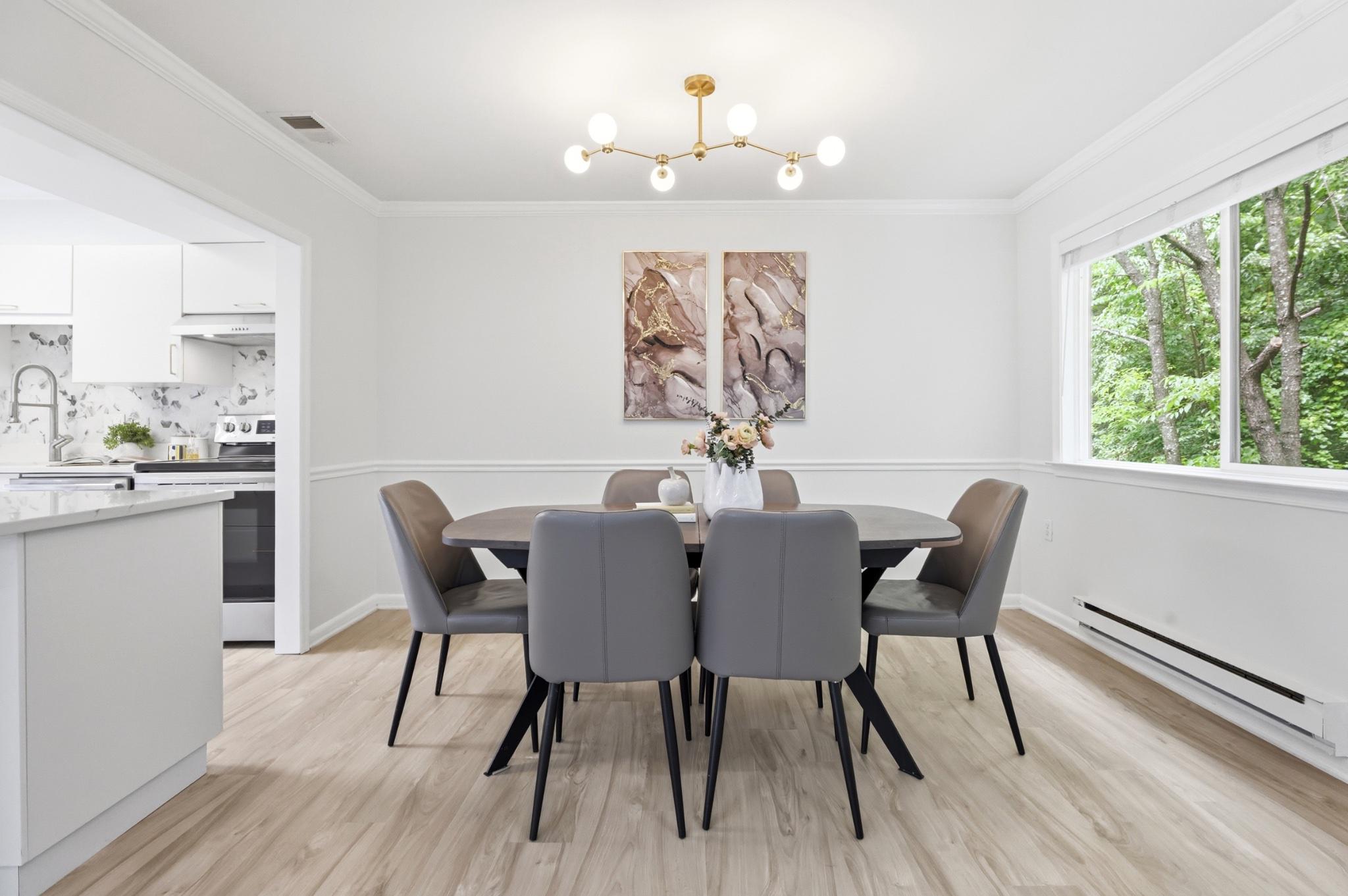 2260 Covent Gardens Court Reston, VA 20191 - Photo 8 of 42 Bright dining space with tree-lined views.