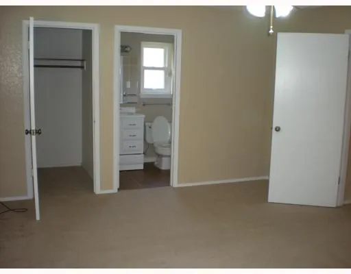 a view of a bathroom with toilet