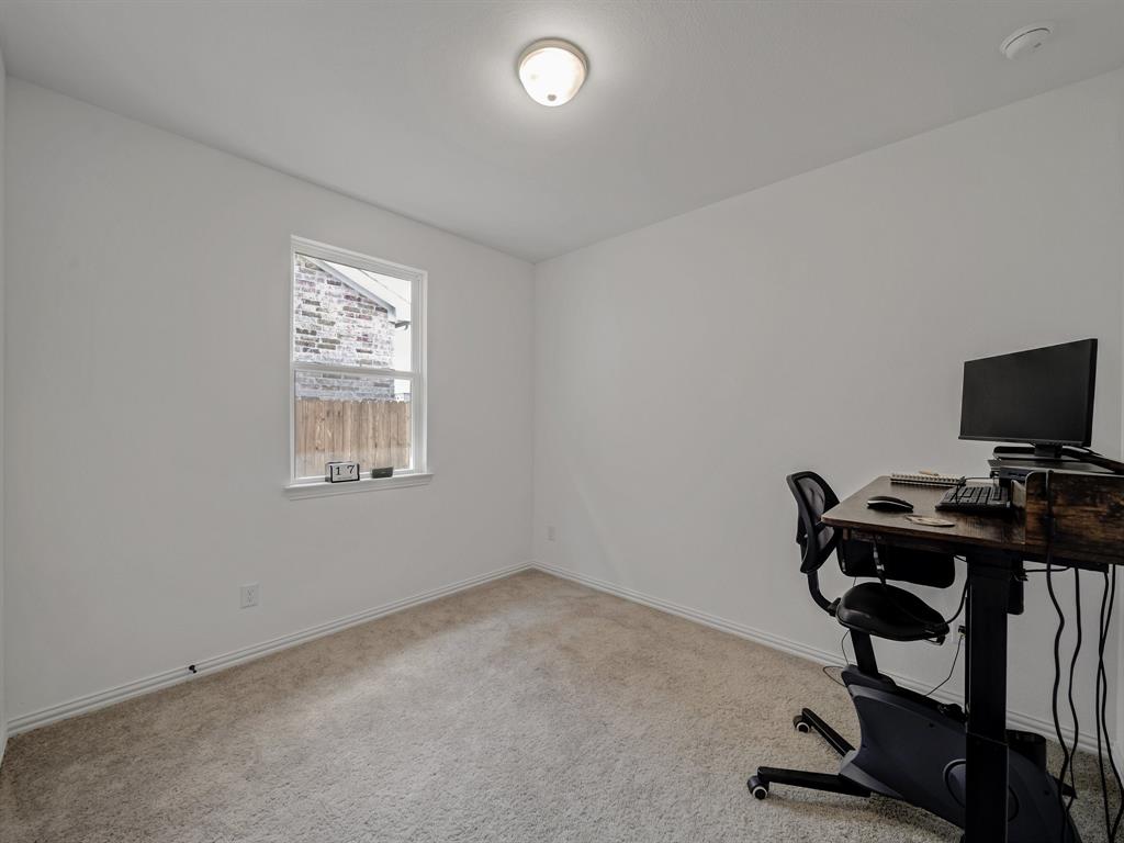 2104 Franklin Road Princeton, TX 75407 - Photo 22 of 36 a view of workspace with a window