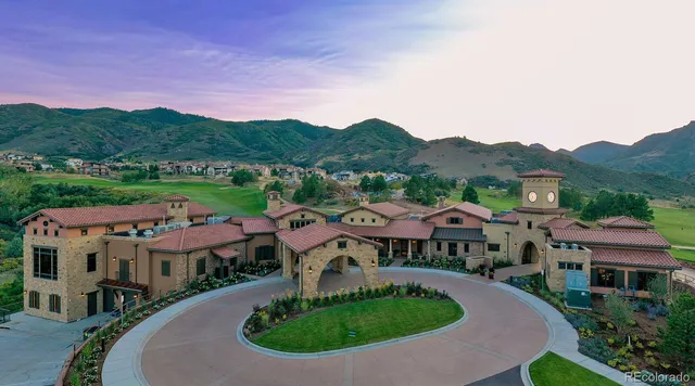 an aerial view of residential houses and outdoor space