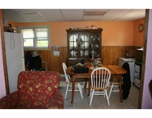 1 Oakham Road North Brookfield, MA 01535 - Photo 2 of 7 a view of a dining room with furniture and window
