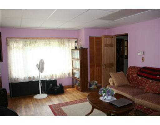 1 Oakham Road North Brookfield, MA 01535 - Photo 5 of 7 a living room with furniture and a window