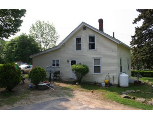 1 Oakham Road North Brookfield, MA 01535 - Photo 6 of 7 a view of a house with backyard