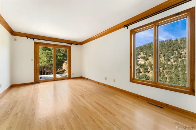 an empty room with windows